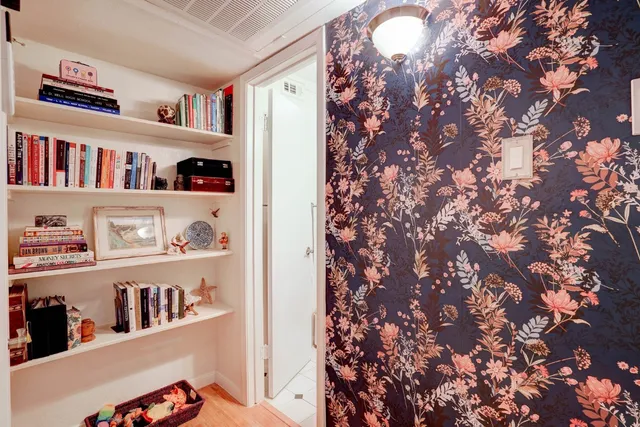 a view of a house with backyard and a patio