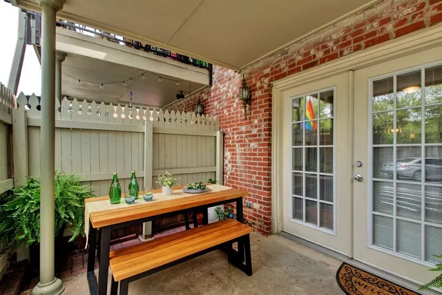 a view of a house with a yard patio and a patio