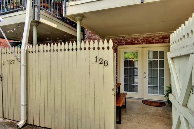 a view of outdoor space with wooden fence