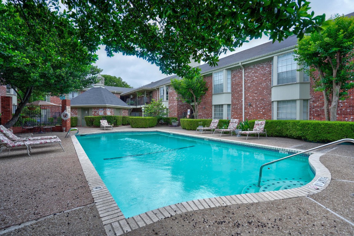 7920 Rockwood Lane, Unit 128 Austin, TX 78757 - Photo 28 of 36 a view of a house with a yard patio and a patio