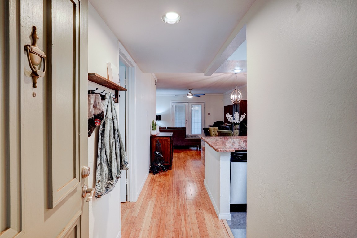 7920 Rockwood Lane, Unit 128 Austin, TX 78757 - Photo 3 of 36 a view of a kitchen and an entryway