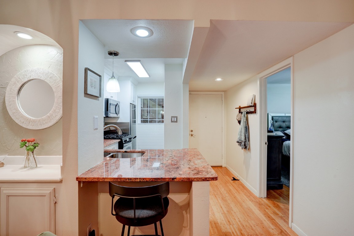 7920 Rockwood Lane, Unit 128 Austin, TX 78757 - Photo 10 of 36 a view of a kitchen and a sink