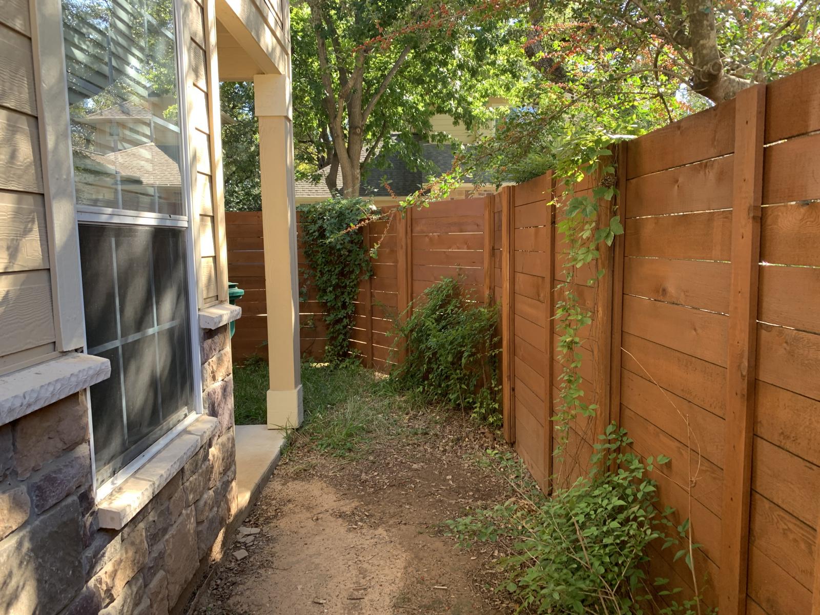 11000 Anderson Mill Road, Unit 29 Austin, TX 78750 - Photo 4 of 27 a view of a pathway of a house