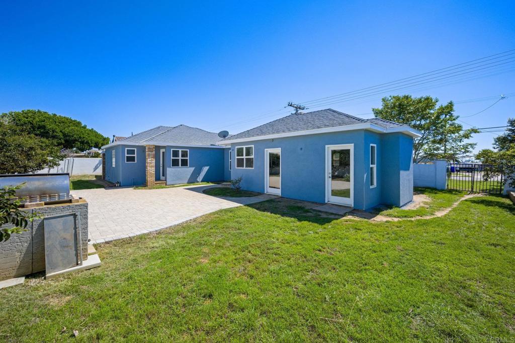 2548 Mesa Drive Oceanside, CA 92054 - Photo 24 of 33 a front view of a house with a yard
