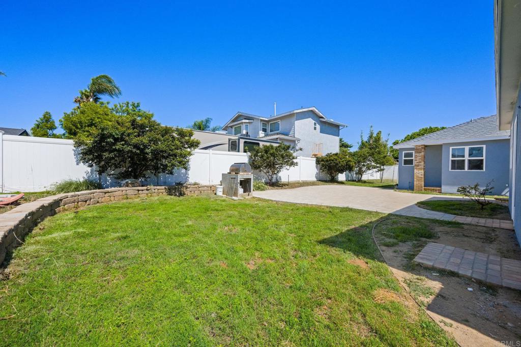 2548 Mesa Drive Oceanside, CA 92054 - Photo 25 of 33 a view of a house with a yard