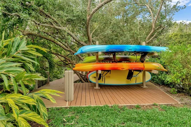 a view of a swimming pool with a yard