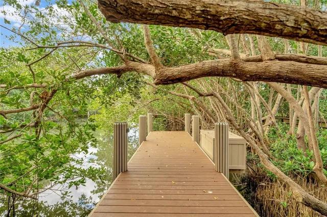 a front view of a house with a yard and a garage