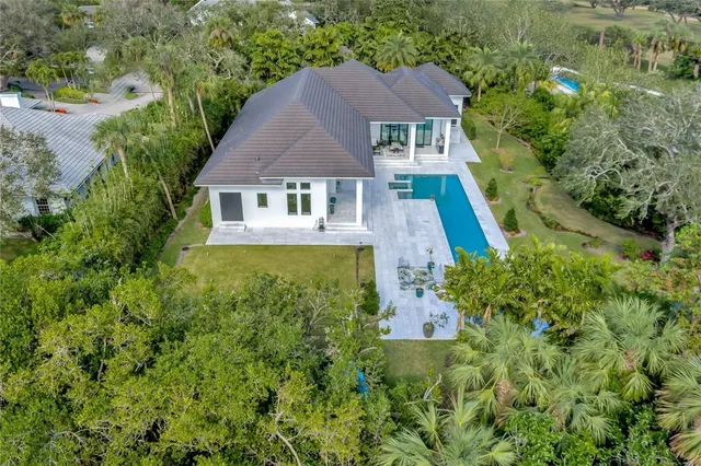 a view of yard with patio