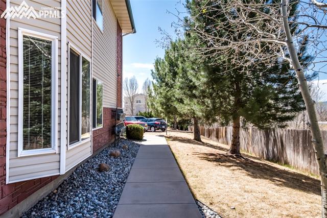 2094 Legacy Ridge View, Unit 101 Colorado Springs, CO 80910 - Photo 7 of 7 Walkway to the unit.
