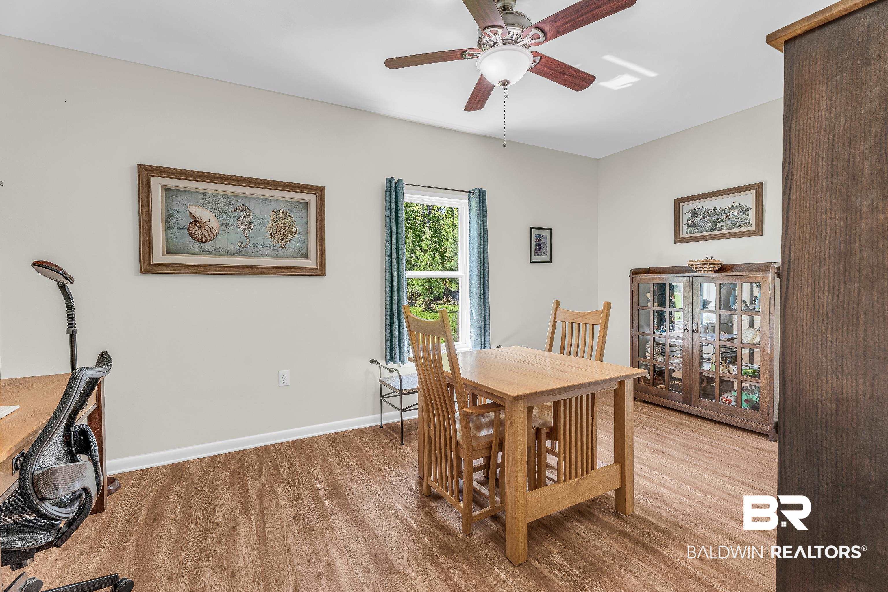 18255 Cactus Court Elberta, AL 36530 - Photo 29 of 53 Dining room featuring light wood-type flooring and a ceiling fan