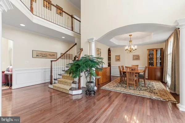 a living room with furniture or couch and a wooden floor