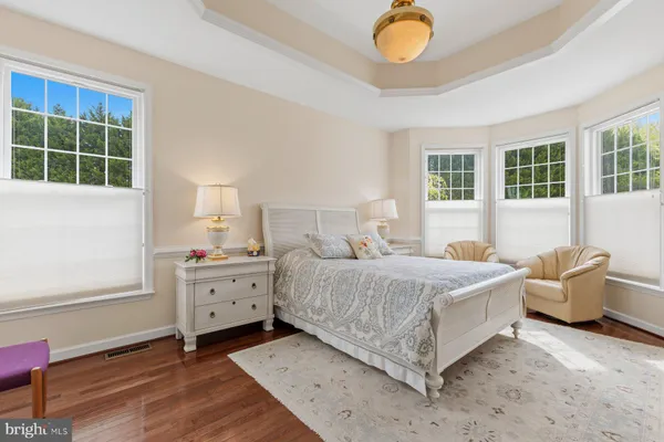 a bedroom with a bed and a cabinets