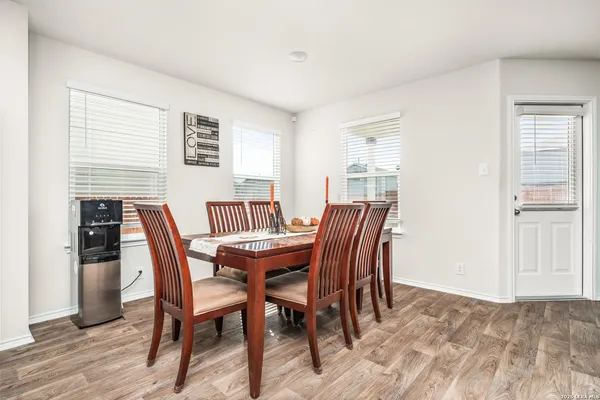 a view of a dining room with furniture