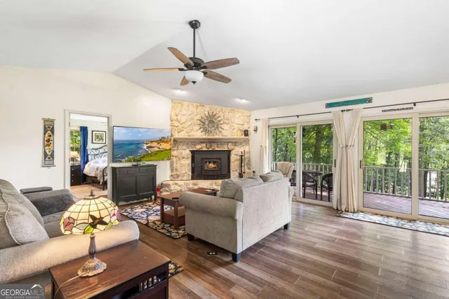 a kitchen with a sink stove and microwave