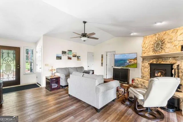 a kitchen with a stove and a microwave