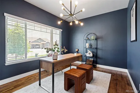 a view of a livingroom with furniture