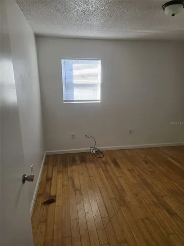 a bathroom with a sink toilet and window