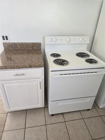 a utility room with washer and dryer