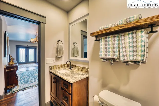 a view of a garage with parked cars