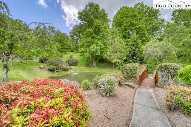 an aerial view of a house having yard