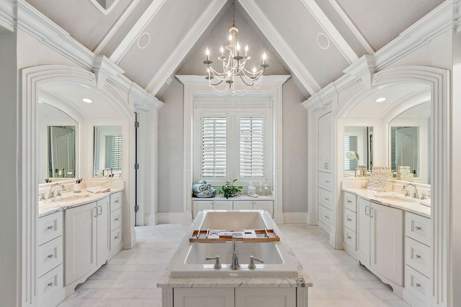 368 Ridge Avenue Winnetka, IL 60093 - Photo 19 of 55 a spacious bathroom with a double vanity sink a large mirror a bathtub and next to a window