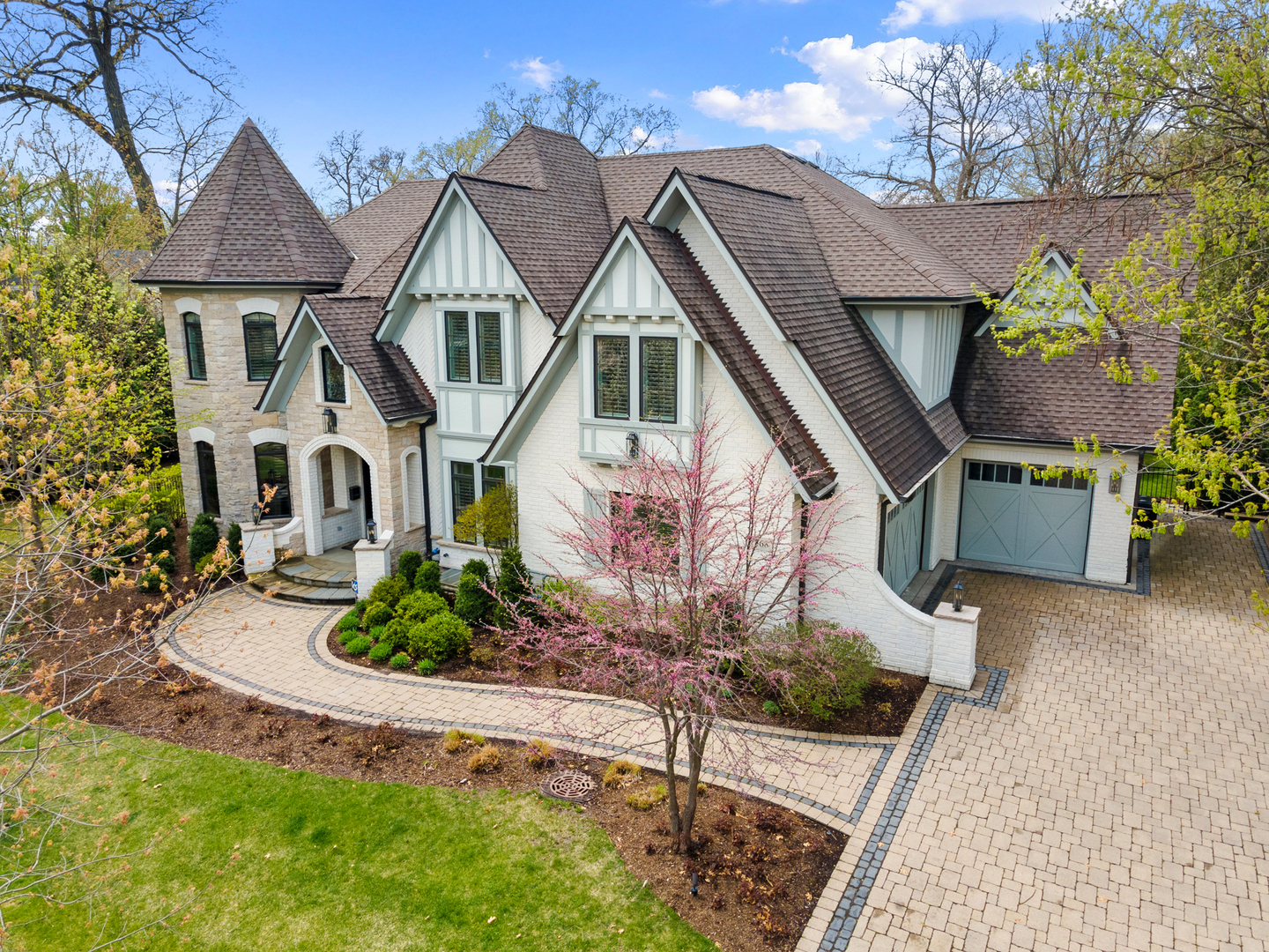 368 Ridge Avenue Winnetka, IL 60093 - Photo 3 of 55 a front view of a house with garden