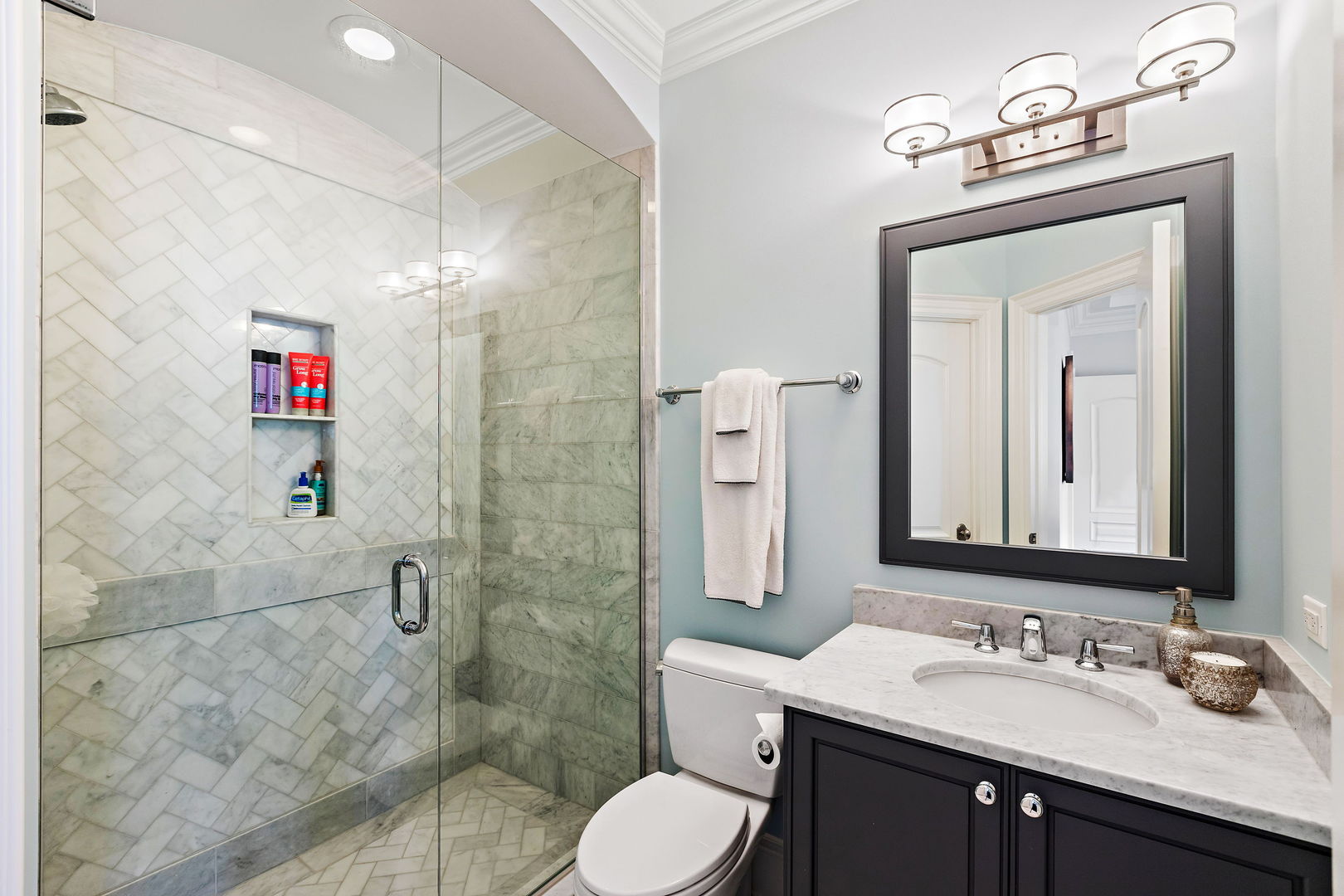 368 Ridge Avenue Winnetka, IL 60093 - Photo 37 of 55 a bathroom with a sink vanity mirror and toilet