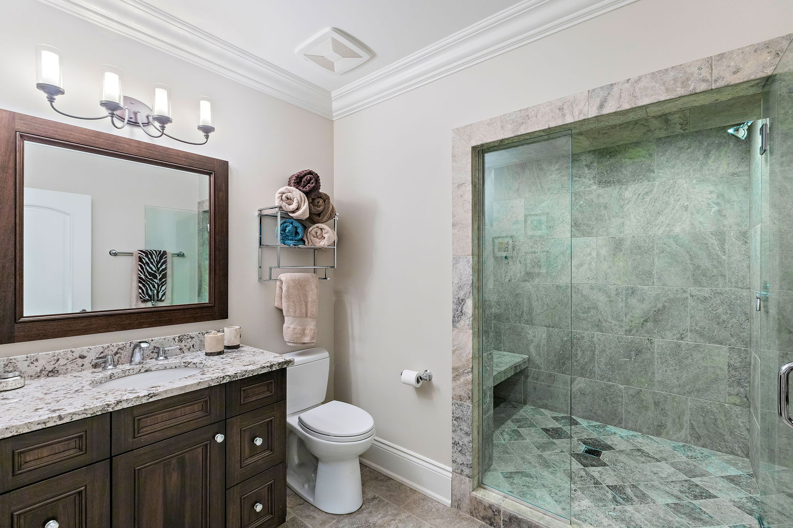 368 Ridge Avenue Winnetka, IL 60093 - Photo 40 of 55 a bathroom with a granite countertop sink toilet and shower