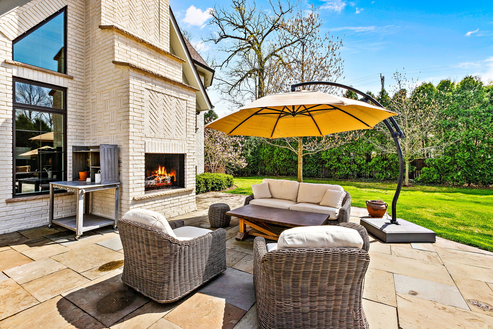 368 Ridge Avenue Winnetka, IL 60093 - Photo 45 of 55 a patio view with patio a fire pit and a yard