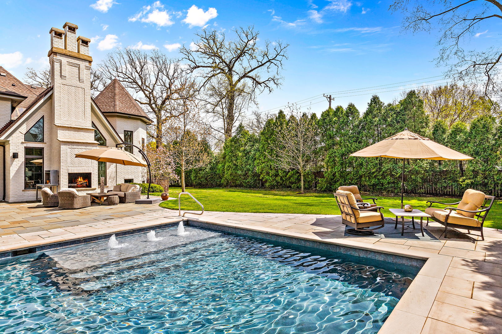 368 Ridge Avenue Winnetka, IL 60093 - Photo 46 of 55 a view of a house with swimming pool and sitting area