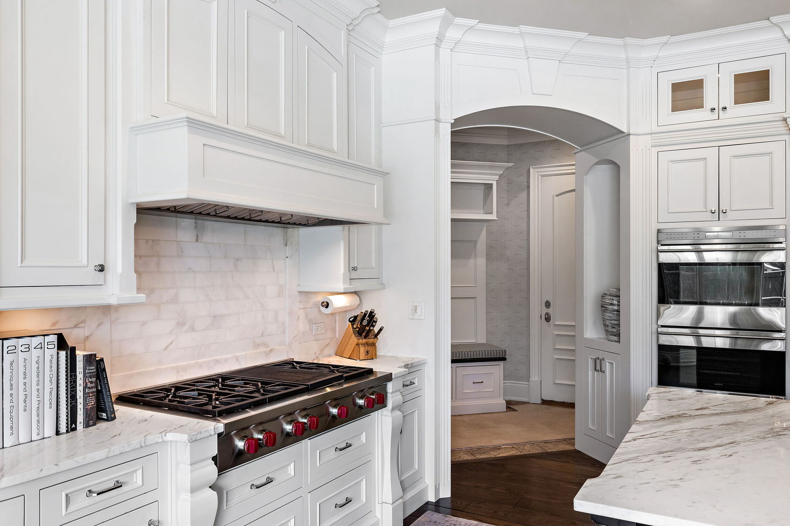 368 Ridge Avenue Winnetka, IL 60093 - Photo 9 of 55 a kitchen with stainless steel appliances granite countertop a stove and a refrigerator