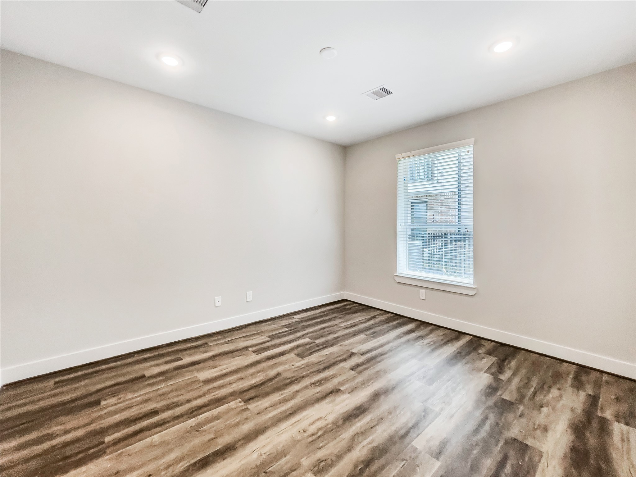 1270 North Post Oak Road, Unit A Houston, TX 77055 - Photo 8 of 33 Versatile first-floor room perfect as a bedroom or study.