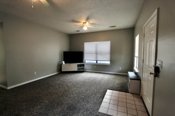 a view of a livingroom with a flat screen tv