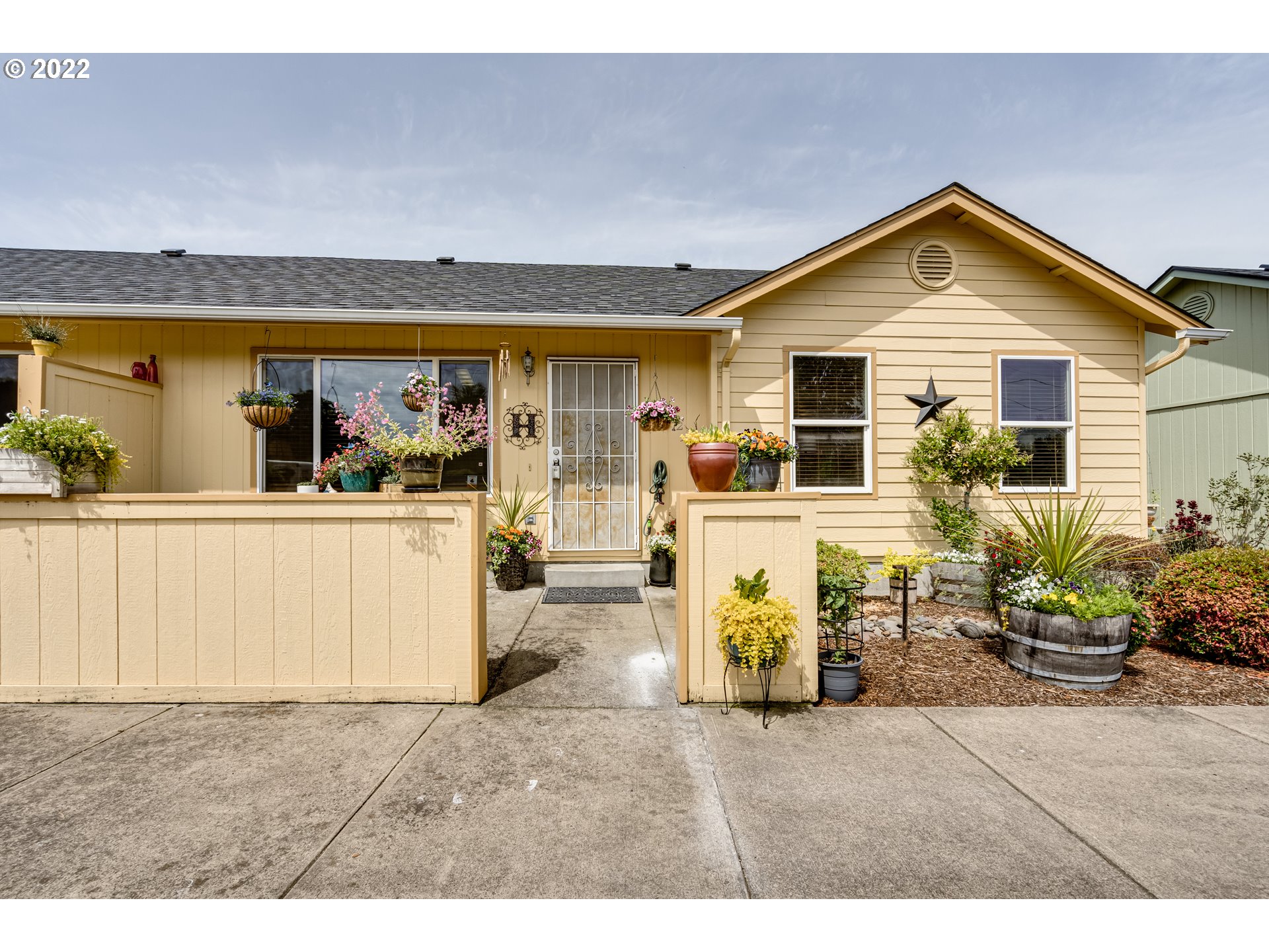 5502 E Street Springfield, OR 97478 - Photo 1 of 17 a view of a house with a outdoor space