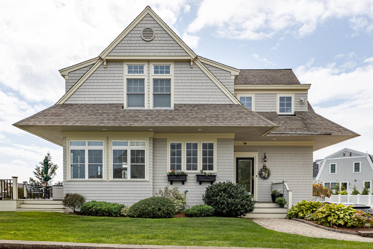 15 Deans Hollow Road Mashpee, MA 02649 - Photo 3 of 20 a front view of a house with a yard