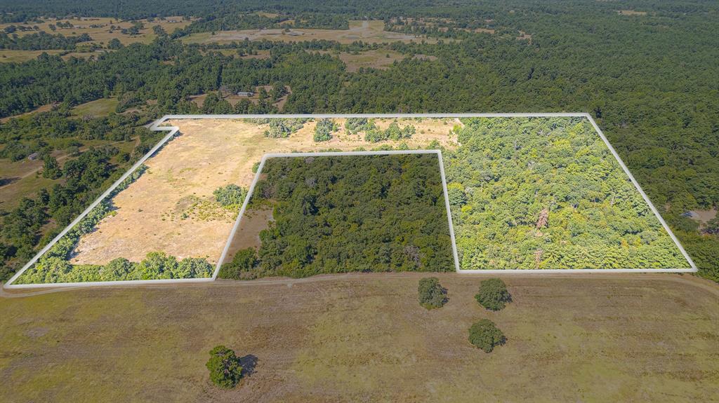 a view of a swimming pool with a outdoor seating