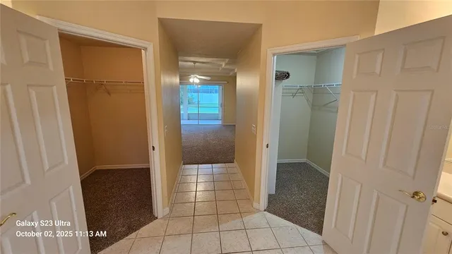 a bathroom with a glass door shower