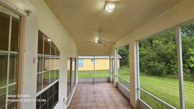 a view of a bathroom with a tub and shower