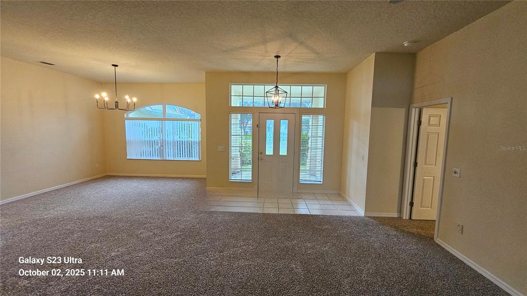 41 Creek Bluff Way Ormond Beach, FL 32174 - Photo 6 of 33 a view of an empty room with a window
