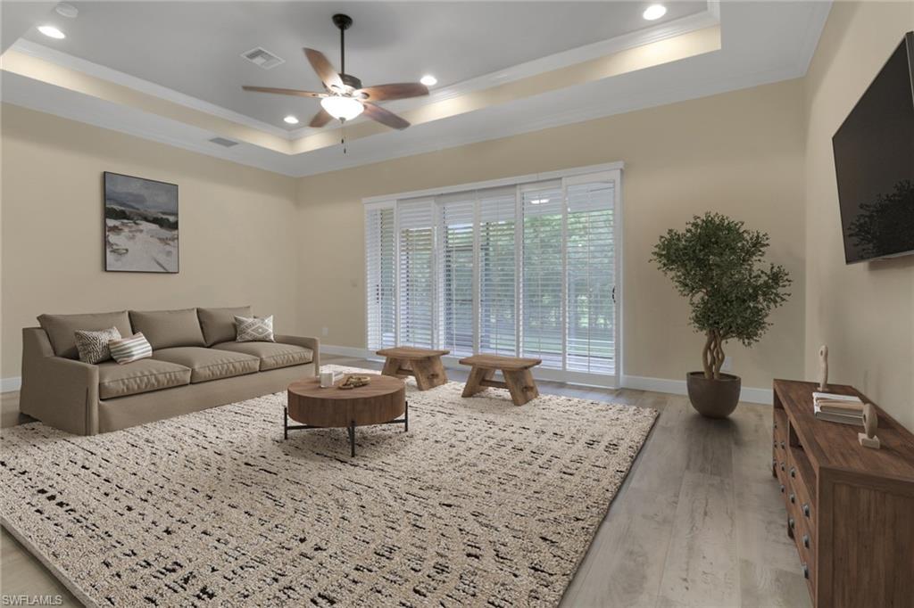 17094 Wrigley Circle Fort Myers, FL 33908 - Photo 14 of 33 a living room with furniture and a flat screen tv