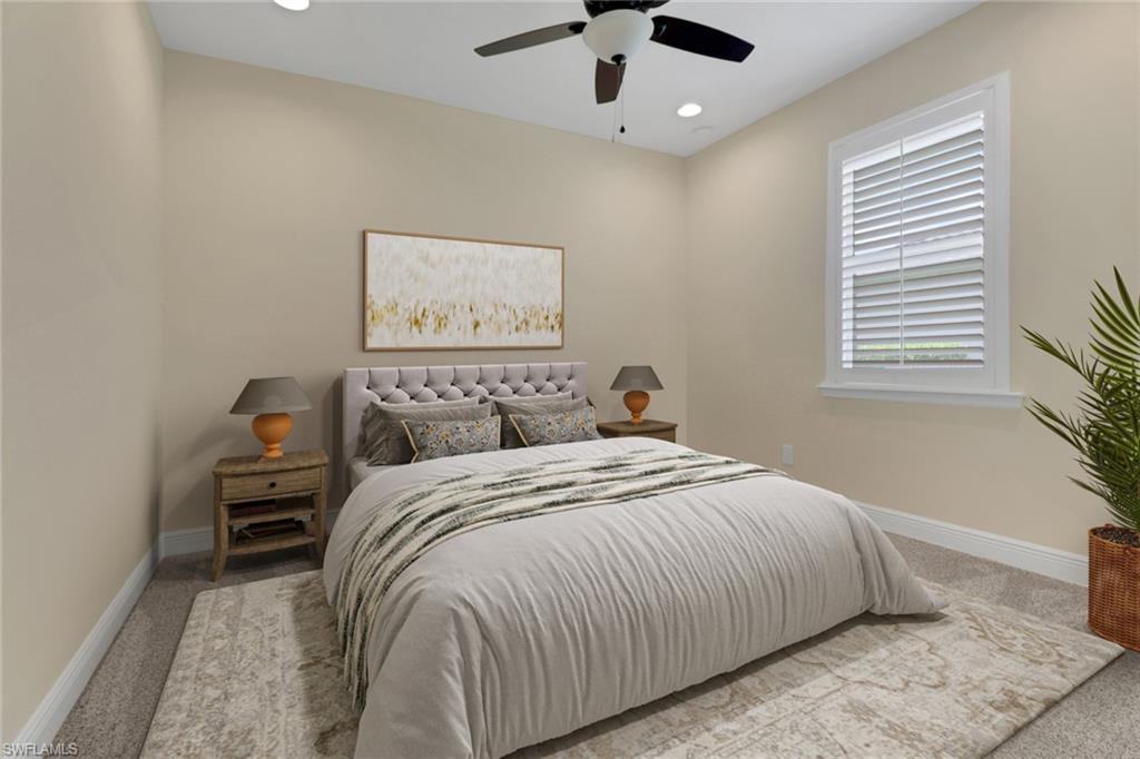 17094 Wrigley Circle Fort Myers, FL 33908 - Photo 19 of 33 a bedroom with a large bed and a window