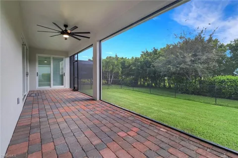 a view of a porch with a yard