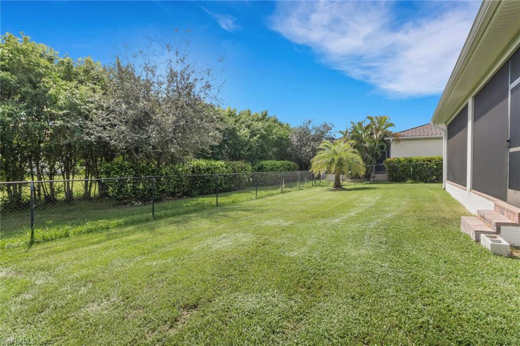 17094 Wrigley Circle Fort Myers, FL 33908 - Photo 25 of 33 a view of a field with grass