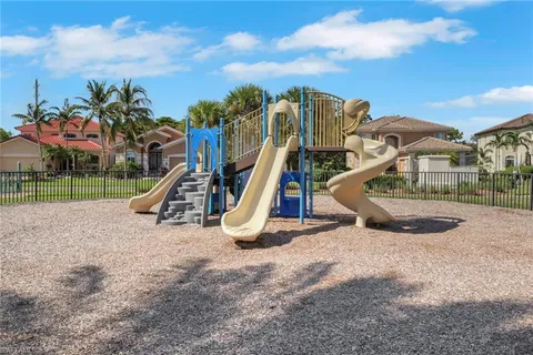 a view of a park with a slide