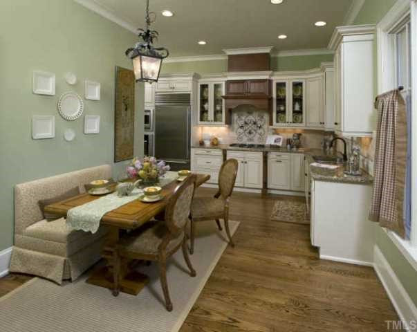 2608 Graves Court Raleigh, NC 27608 - Photo 5 of 11 Sunny kitchen with breakfast area. Butler's pantry with wet bar leads to formal dining room. Other