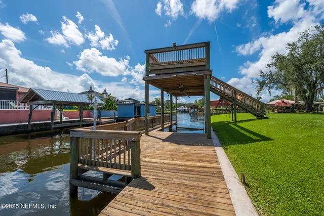 a view of a lake with a deck