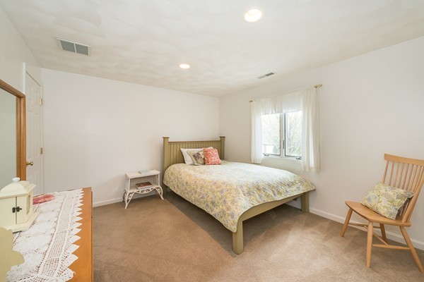10 Scotland Road Lexington, MA 02420 - Photo 19 of 24 a bedroom with a bed chair and window