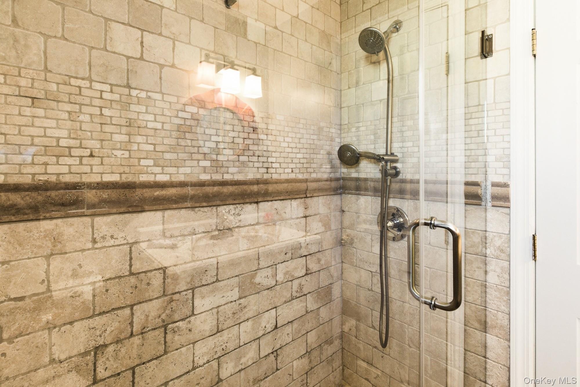 818 Dune Road Westhampton Beach, NY 11978 - Photo 12 of 30 a bathroom with a shower