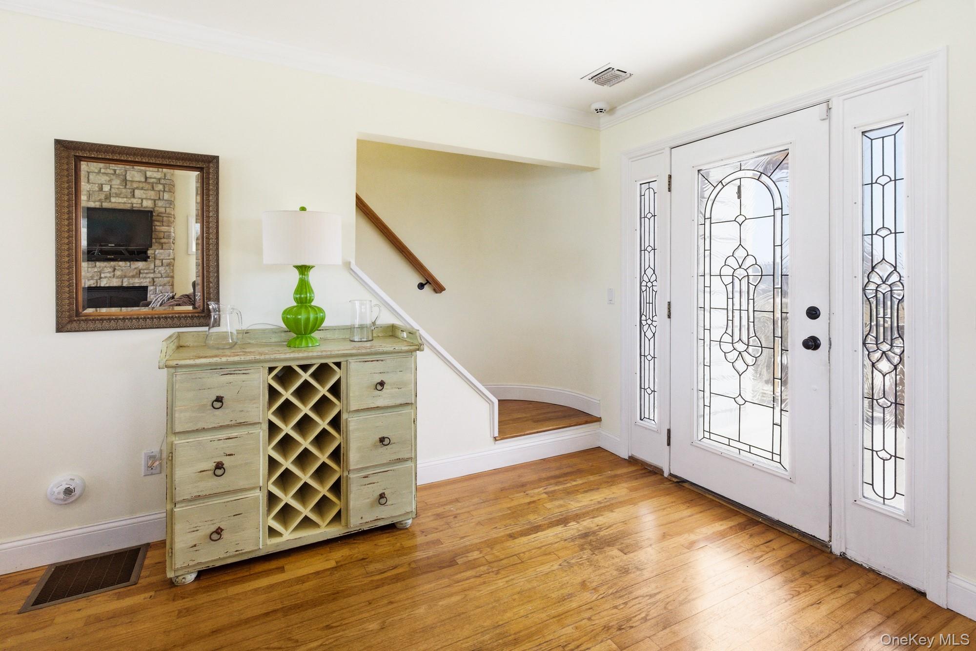 818 Dune Road Westhampton Beach, NY 11978 - Photo 4 of 30 a view of entryway with wooden floor