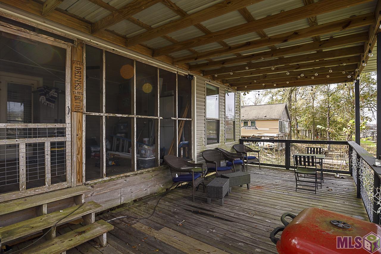 21260 Diversion Canal Road St. Amant, LA 70774 - Photo 17 of 40 Screened-in Back Patio
